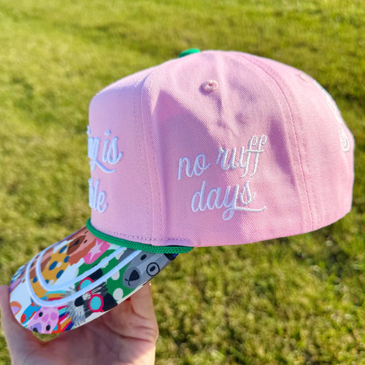 Anything's Pawsible Trucker Hat