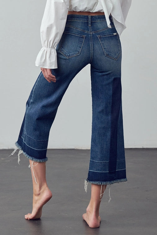 The West Mid Rise Raw Patched Cropped Jean